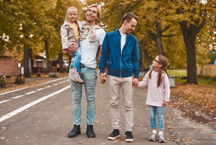 Male couple with two girls